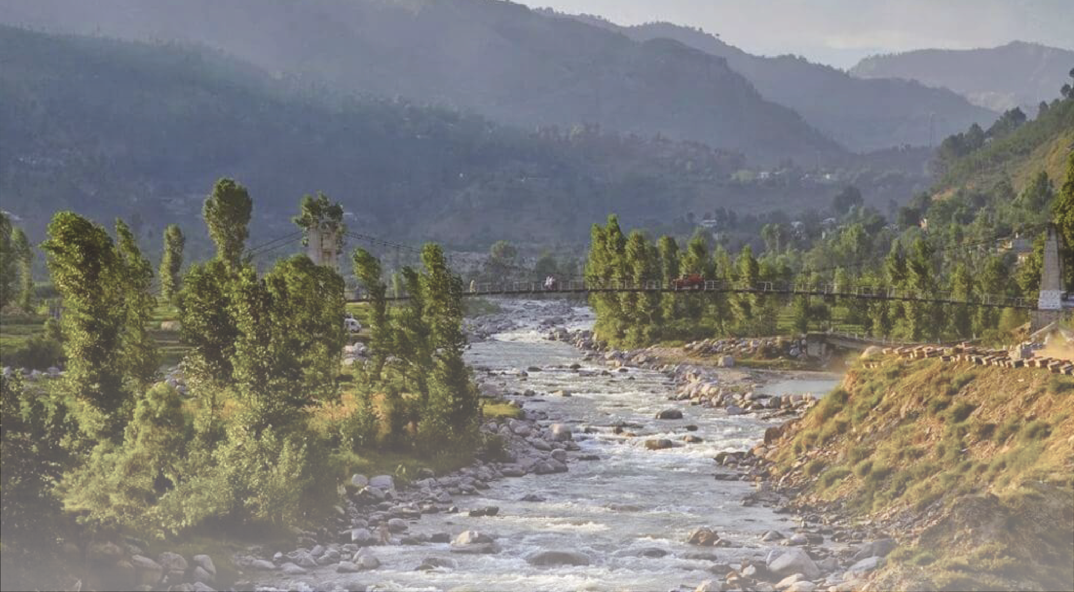 Enjoying tea in Siran Valley with mountain and river view Pakistan